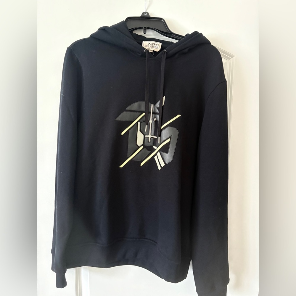 Hermes men’s Black Hoodie with Design
Size European Medium (runs small) $360